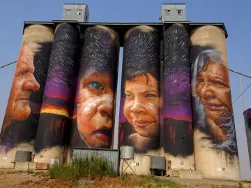 Grain silos painted with art work (flickr/82134796@N03)