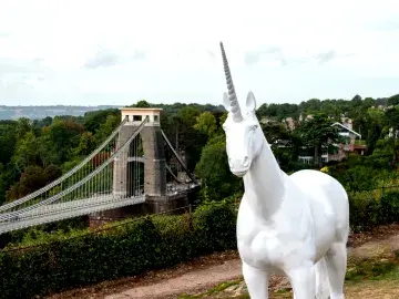 A unicorn in front of the Clifton Suspension Bridge