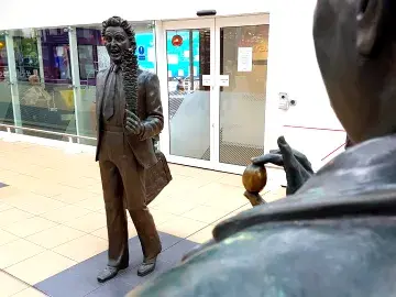 Ken Dodd statue in Liverpool Lime Street station
