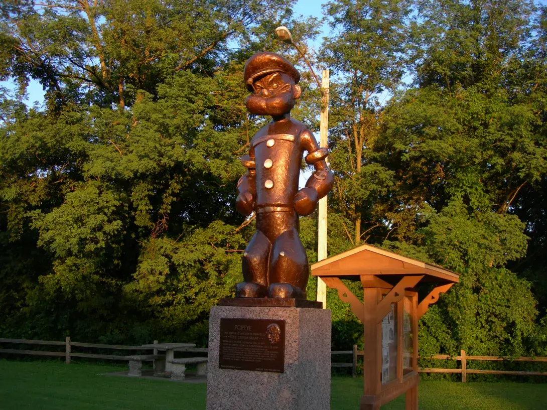 A popeye statue stands overlooking the Mississippi River bridge in Chester, Illinois