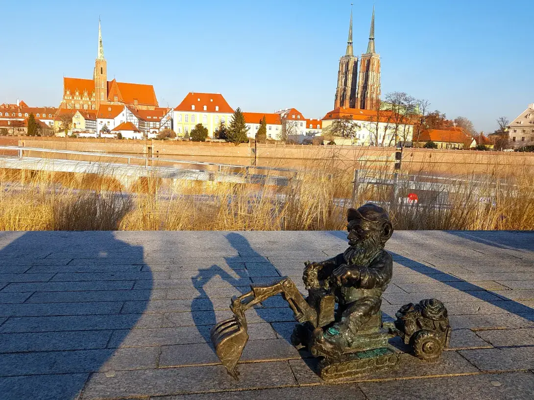 A dwarf with a digger overlooks the city of Wrocław