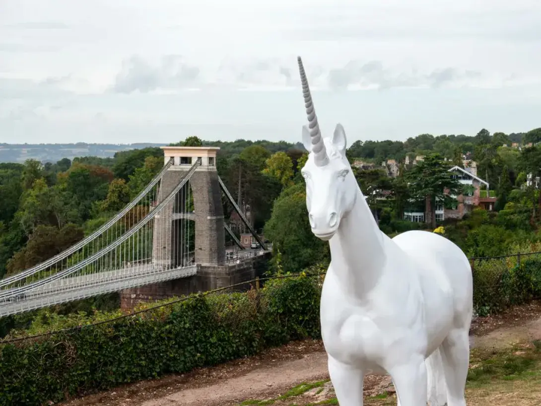 A unicorn in front of the Clifton Suspension Bridge