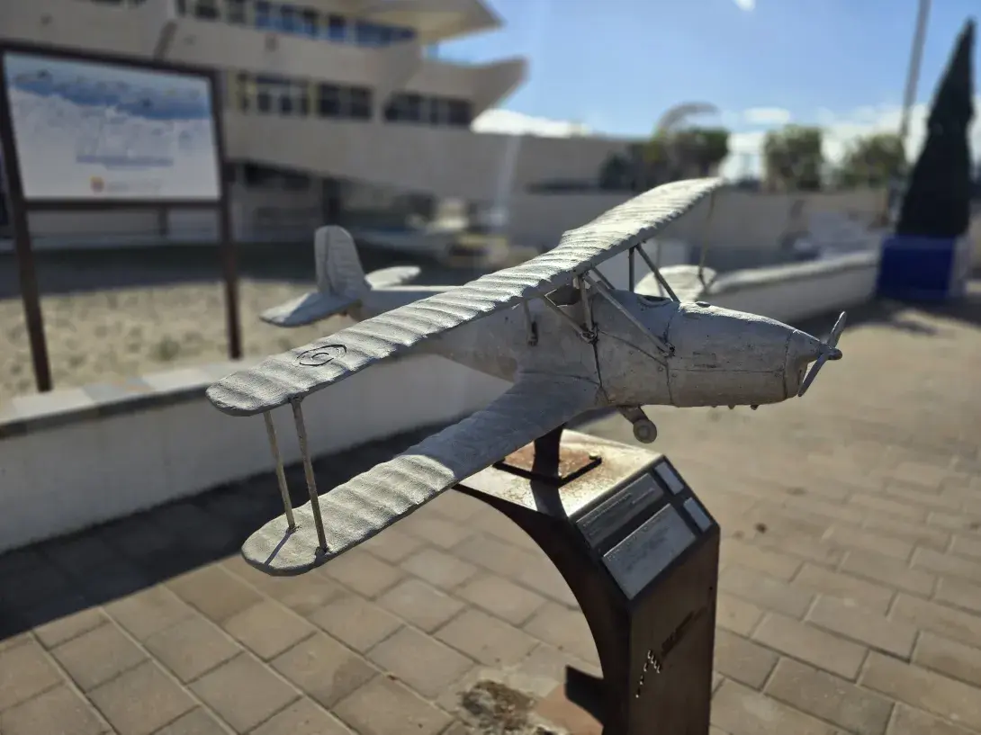 Metal biplane sculpture